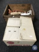 A boxed Leitz projector with screen together with a vintage wooden crate containing two telephones