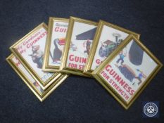 Six gilt framed Guinness advertisements