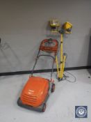 A Flymo lawn rake compact 340 electric mower and set of site lights