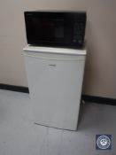 A Cata under bench fridge and a Sharp microwave