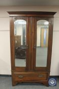 A late Victorian mahogany mirrored wardrobe, width 12 cm.