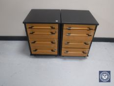 A pair of four drawer under desk chests on wheels