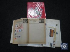 A basket of Stanley Gibbons Great Britain stamp album and further folder and stamps of the world