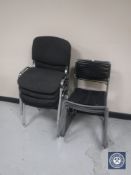 Four metal framed stacking chairs and another five metal framed stacking chairs