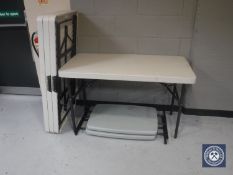 Four Lifetime plastic folding trestle tables and two further folding tables