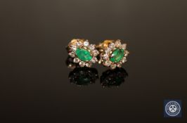 A pair of emerald and diamond cluster earrings,