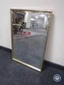 A gilt framed mirror