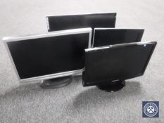 Four LCD PC monitors