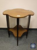 An inlaid mahogany shaped occasional table, width 56 cm.