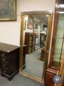 A gilt framed overmantel mirror,