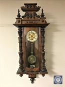 A mahogany cased Vienna wall clock