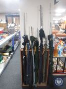 Ten assorted fishing rods in carry bag - Shimano, Shakespeare,