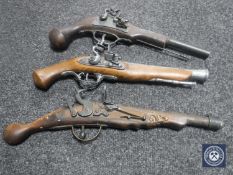 Three replica flintlock pistols