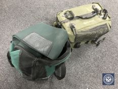 A Wychwood fishing bag containing carry strap and fishing jacket,