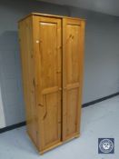 A pine double door wardrobe