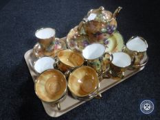 A tray of twenty-six pieces of fruit pattern tea and dinner ware