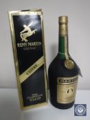 Two 1L bottles of Remy Martin and Martel