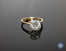 A fine 18ct gold solitaire diamond ring, a brilliant-cut stone of approximately 2.