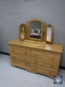 A pine six drawer chest,