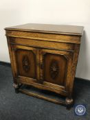 An oak gramophone cabinet