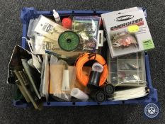 A box of fishing accessories - hooks, lures,