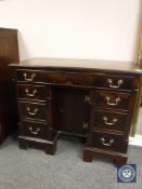 A George III mahogany kneehole desk, width 95 cm.