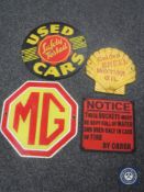 Four cast iron advertising signs - MG, Shell Motor OIl,