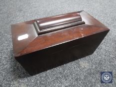 A mahogany sarcophagus form tea caddy