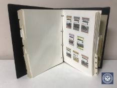 A folder containing stamps of the world all relating to railways
