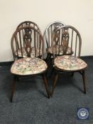 A set of four Ercol dining chairs