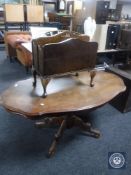 A shaped Italian style coffee table and a walnut magazine rack
