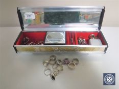 A jewellery box containing costume rings