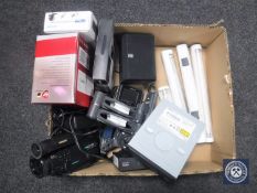 A box of Samsung handy cam, wall bracket, miniature Casio TV, external hard drive,