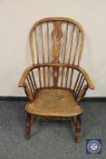 An antique elm and ash country chair, width 55 cm.