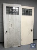 Two 20th century doors with stained glass panel
