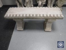 A composition garden bench