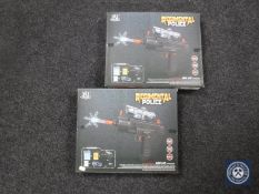 Two boxed Regimental Police water pellet mini uzis