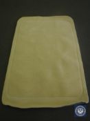 A hand tufted rug, plain loop cut cream, 120 cm x 180 cm, rrp £297.