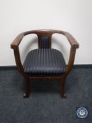 An early 20th century mahogany framed armchair