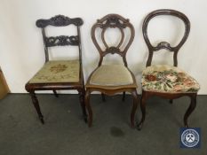 Three antique mahogany dining chairs