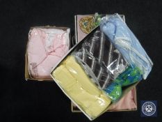 Five storage boxes containing bedding, towels etc.