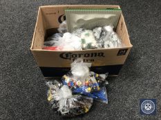 A box of Lego base plates, quantity of Lego and instruction books, Space land and Castles.