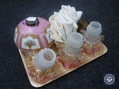 An Art Deco glass light shade together with a tray of assorted light shades, table linen,