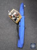 A box of vintage wooden fishing reel, fixed spool reel and line,