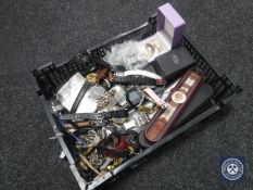 A basket of assorted lady's and gent's wrist watches