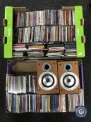 Three boxes of assorted CD's and a pair of micro hi/fi speakers