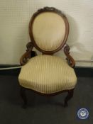 A mahogany spoon back armchair
