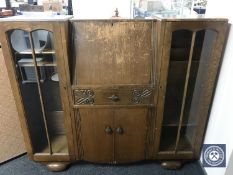 An oak side by side bureau display cabinet