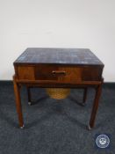 A Danish tiled topped sewing trolley