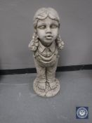 A composition garden statue,